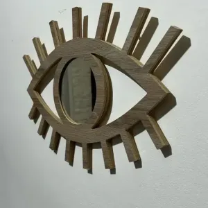 espejo marlene con forma de ojo